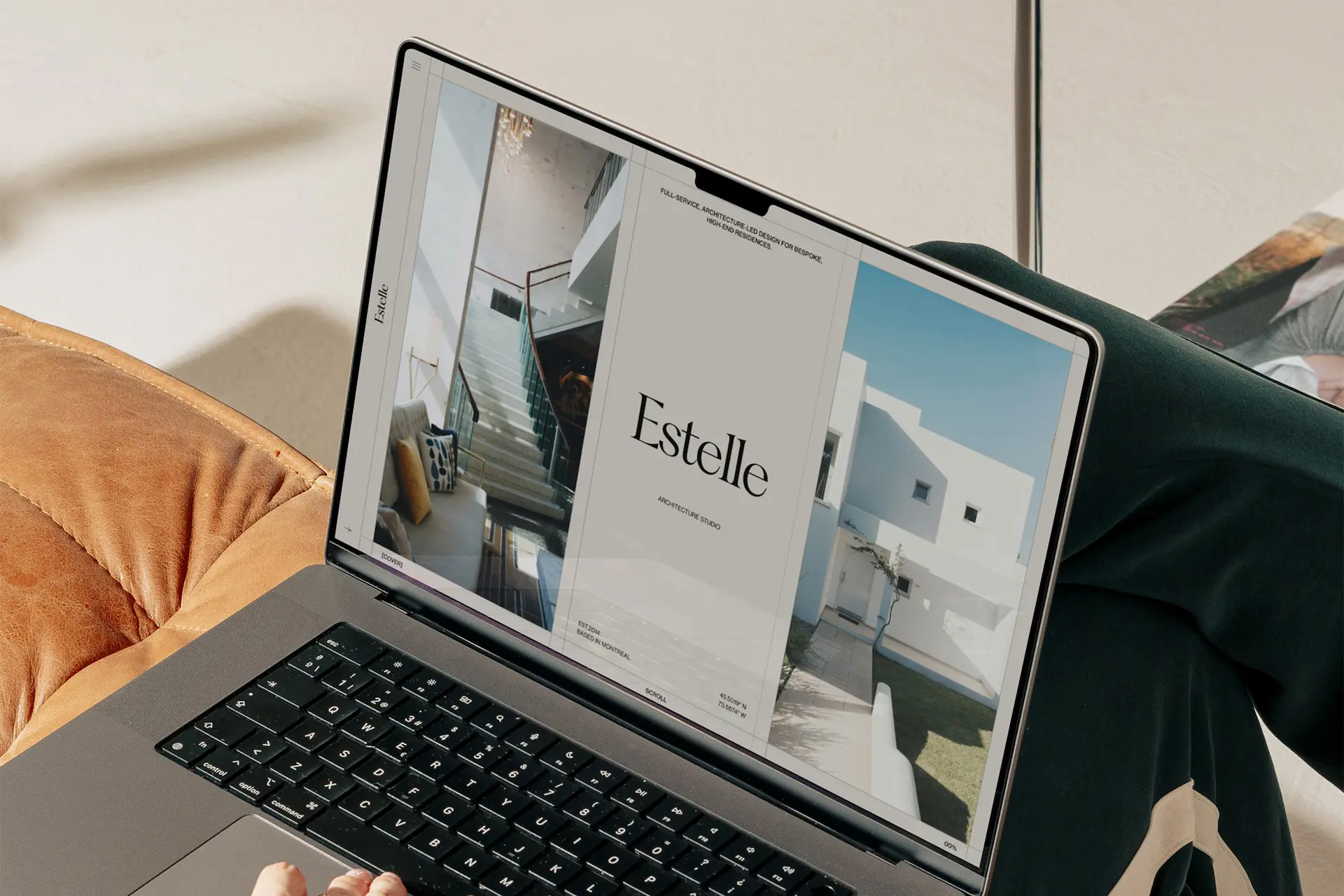 Laptop screen displaying the Estelle architecture studio website featuring modern interior and exterior home designs.